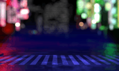 Background image showing a blurry street